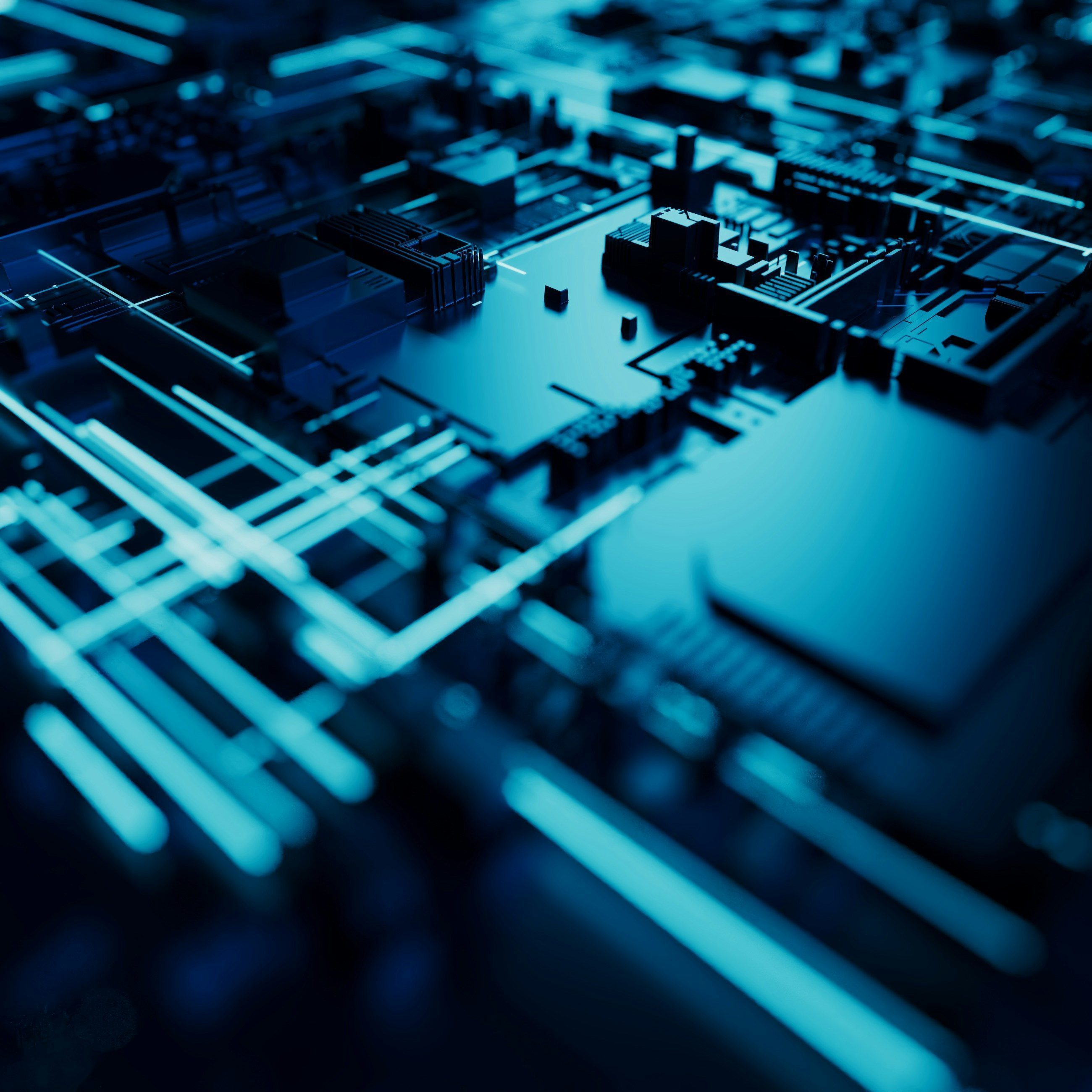 Close-up of a blue-lit futuristic electronic circuit board with glowing pathways and components.